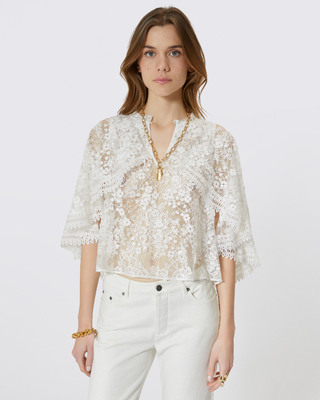 Top with ecru lace cape