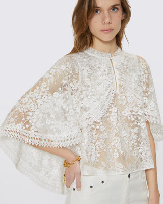 Top with ecru lace cape