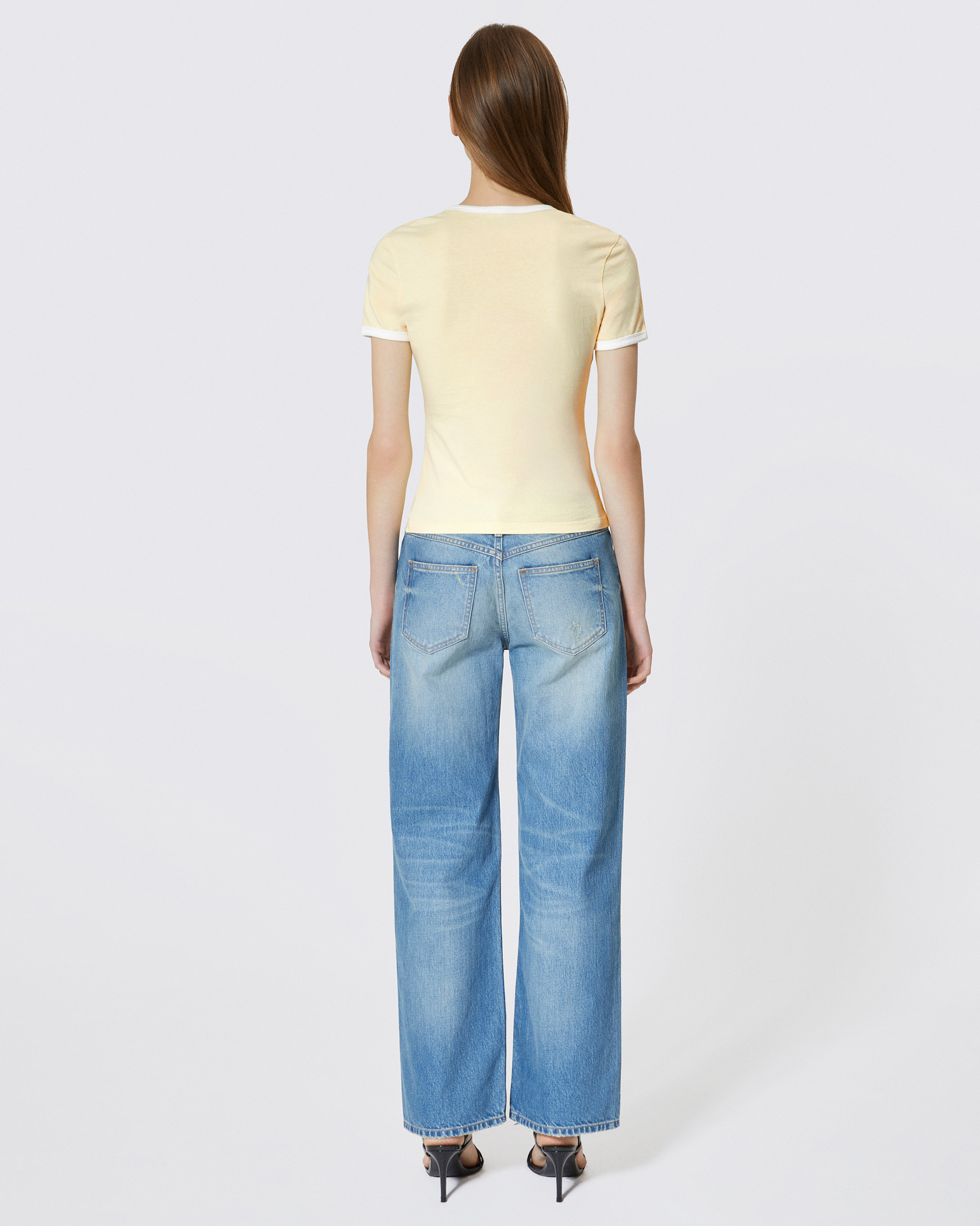 T-shirt with yellow rhinestone logo