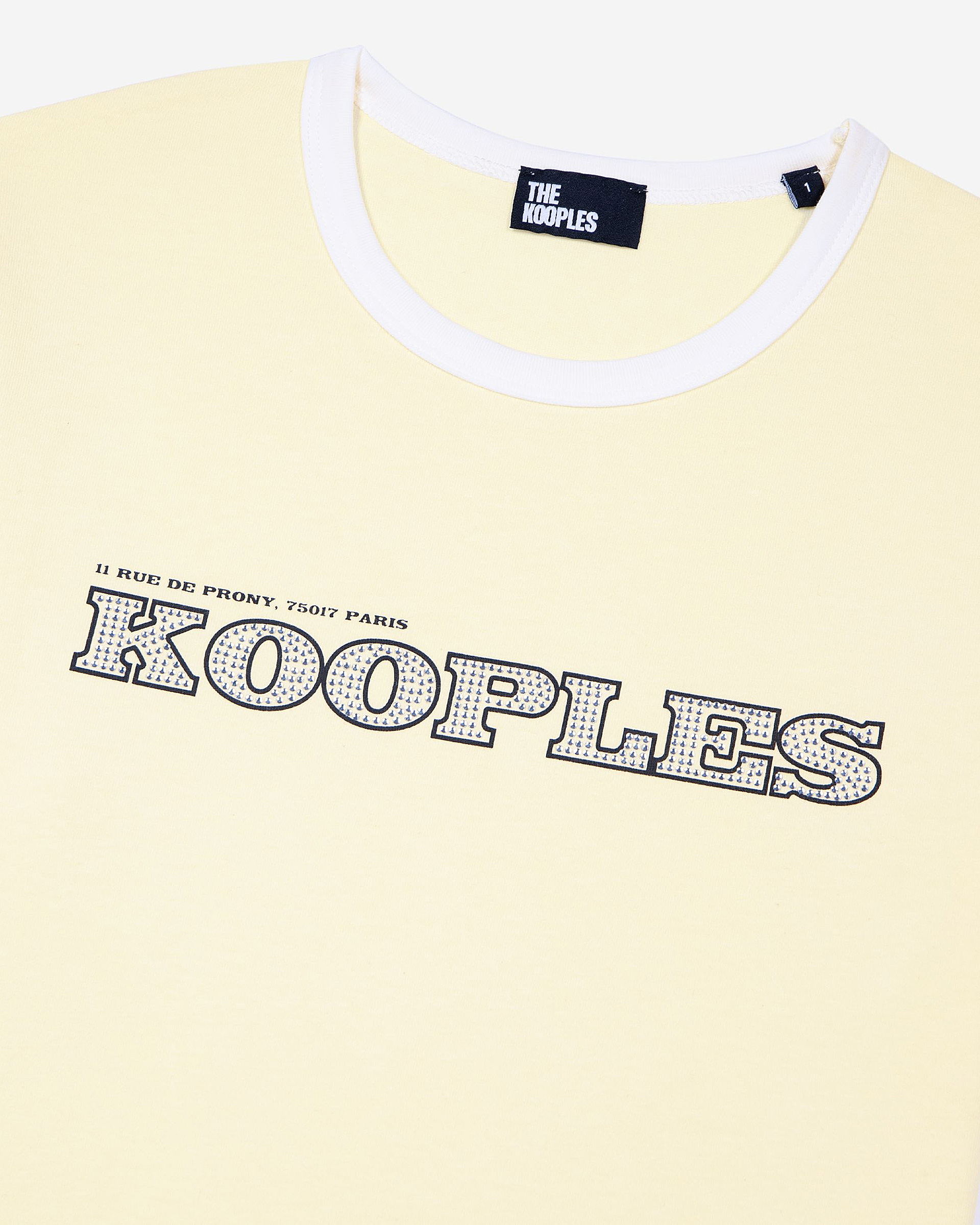 T-shirt with yellow rhinestone logo
