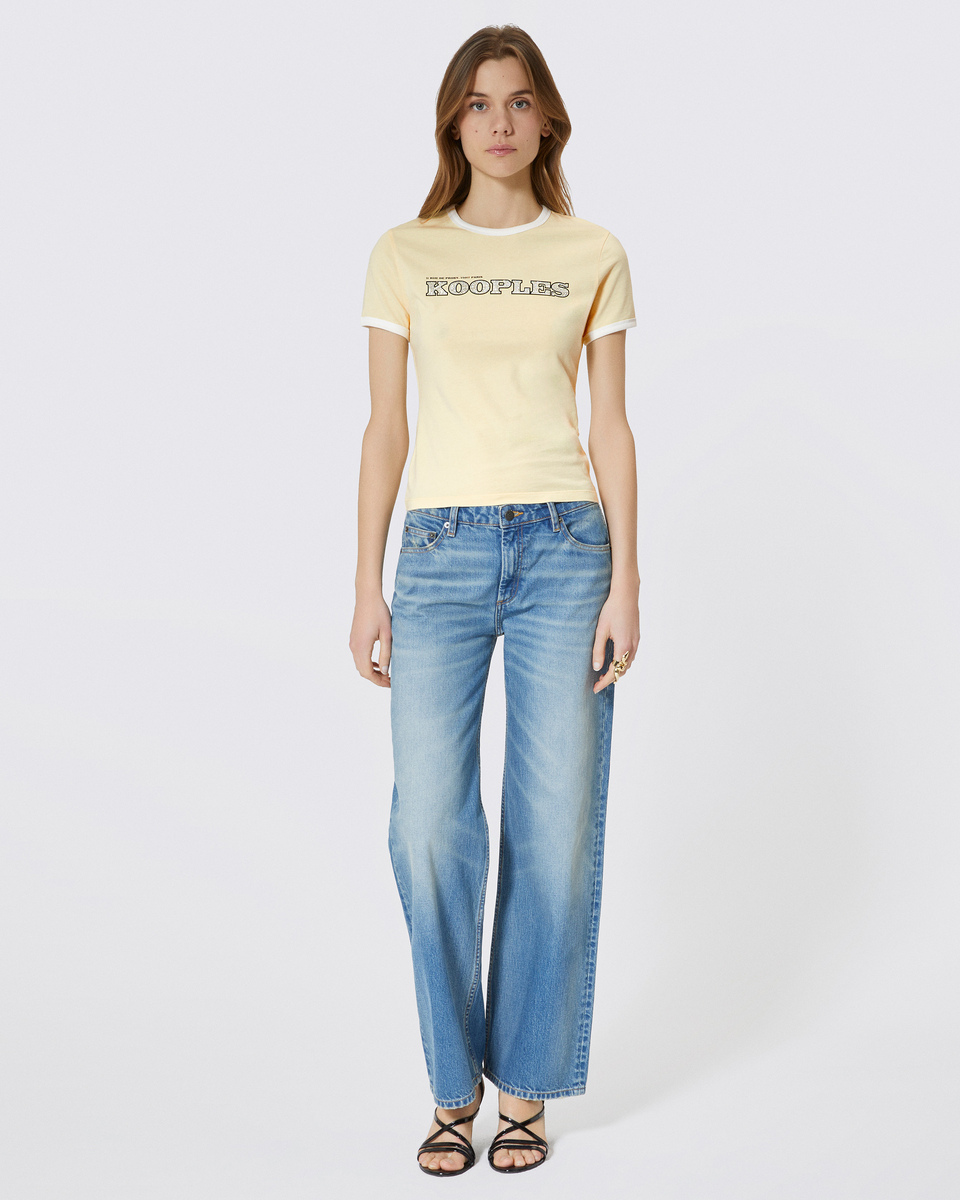 T-shirt with yellow rhinestone logo