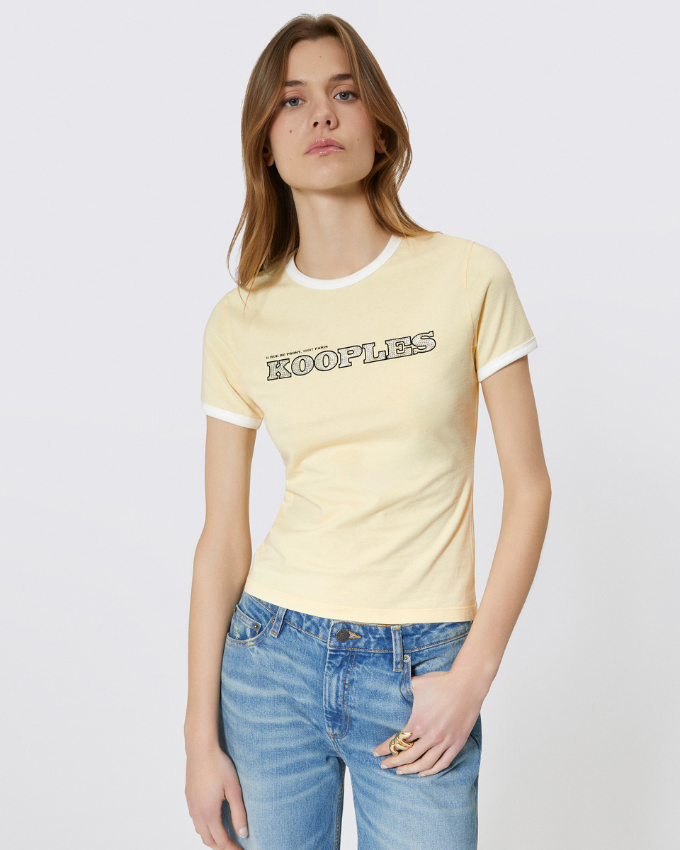 T-shirt with yellow rhinestone logo