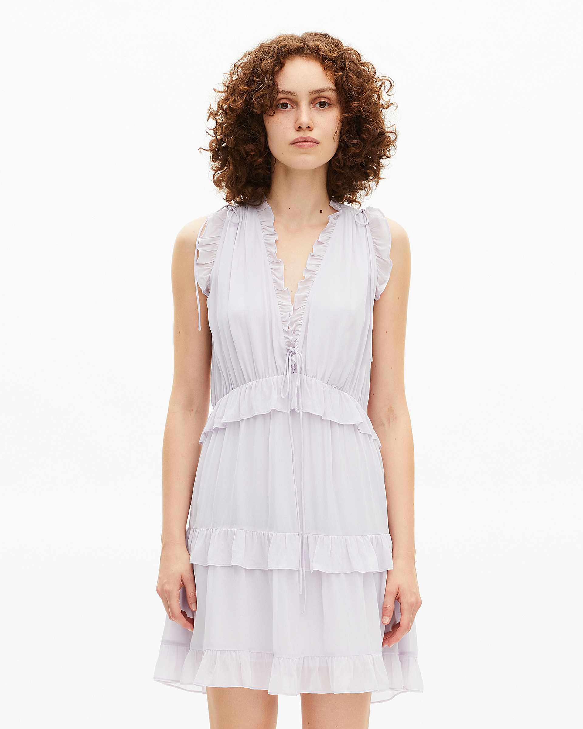 Short dress with lilac ruffles