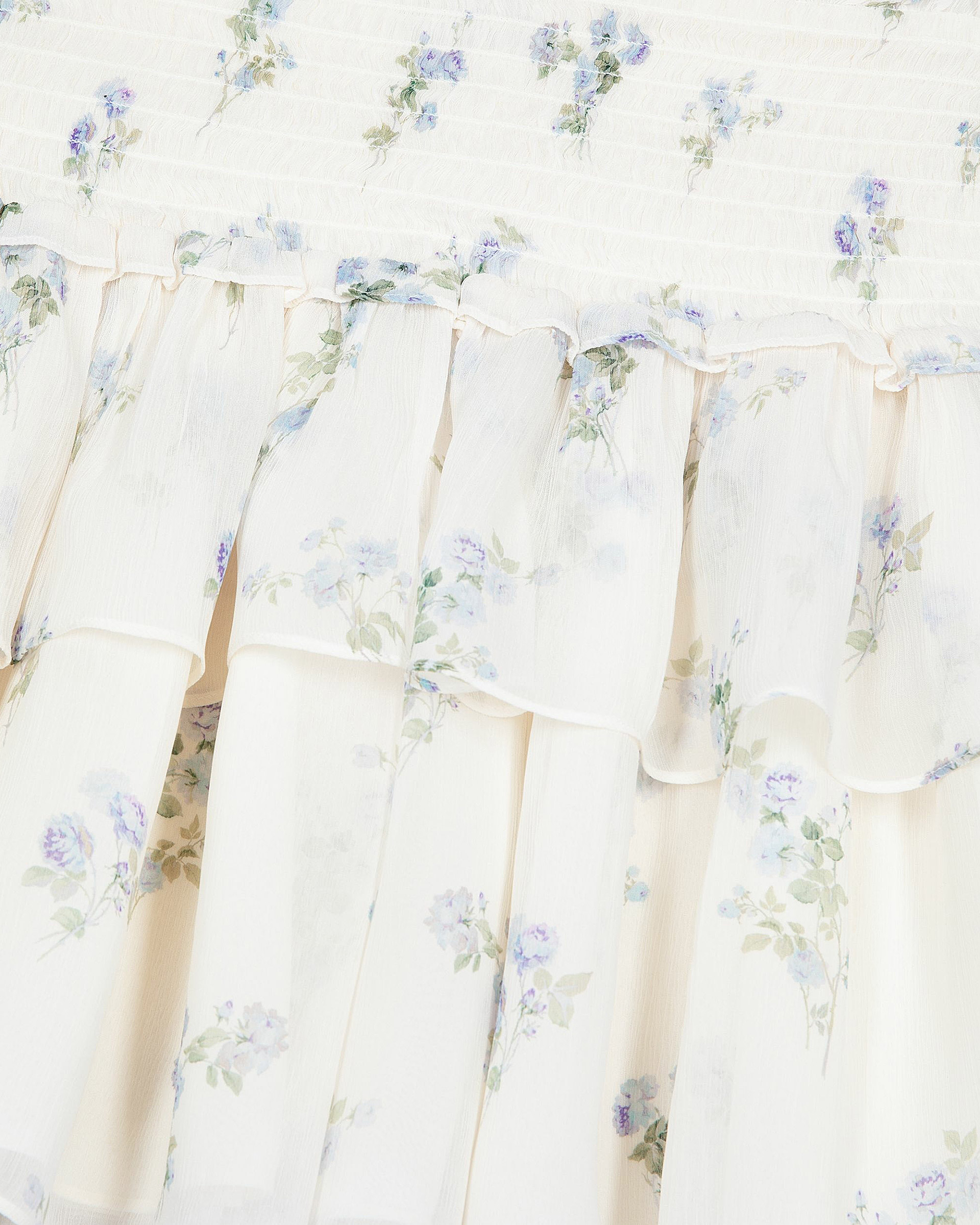White floral print short skirt with ruffles
