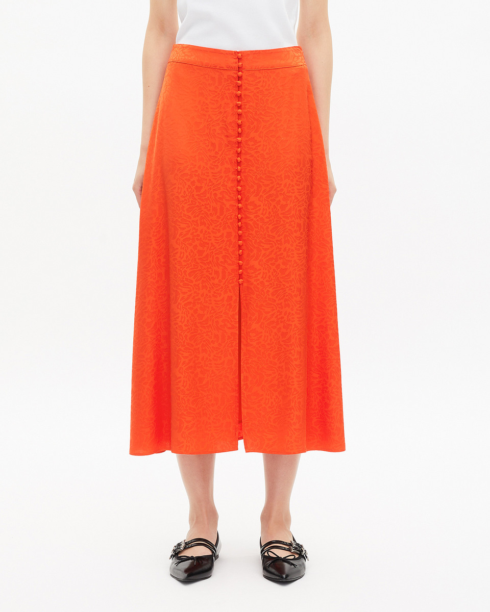 Long skirt in orange jacquard