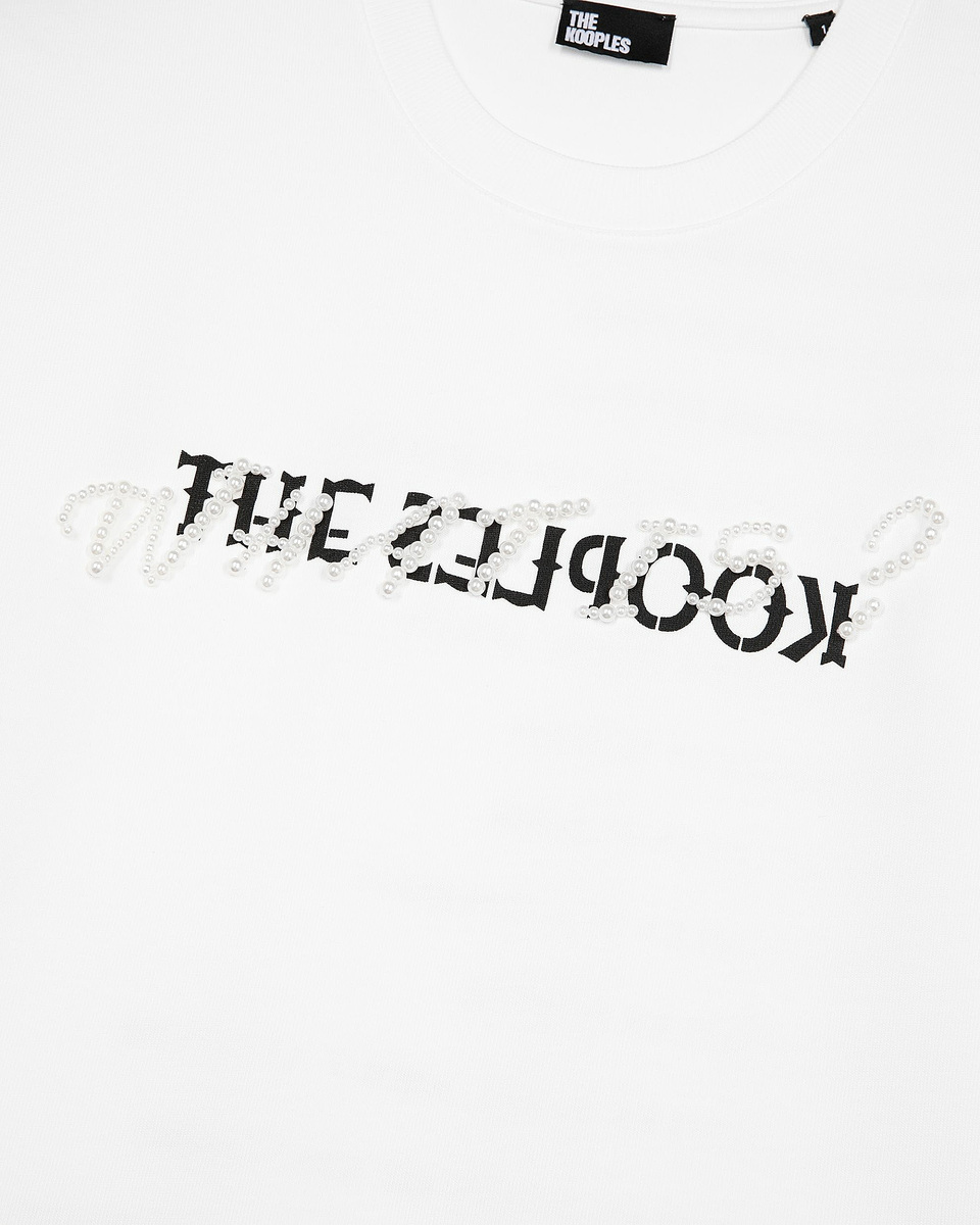 'What Is' T-shirt with white beads