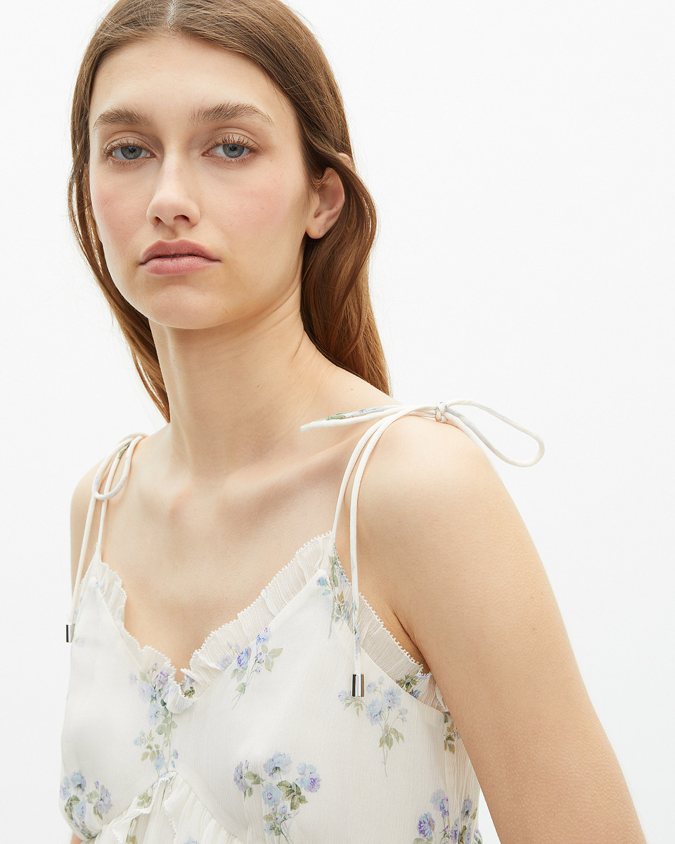 White floral ruffle top