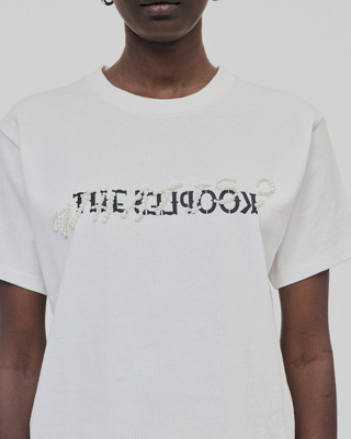 'What Is' T-shirt with white beads