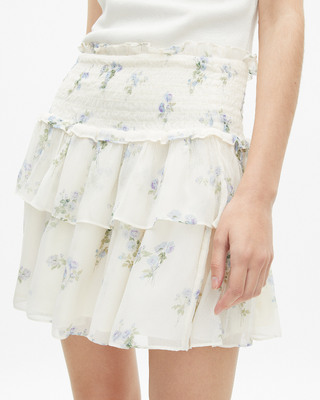 White floral print short skirt with ruffles