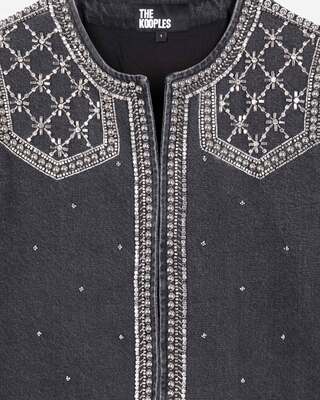 Grey denim jacket with studs and pearls
